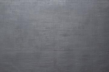 Background from textured canvas painted dark gray