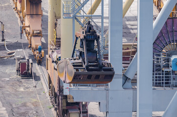 SEAPORT - Bucket and transshipment cranes at the transshipment terminal quay