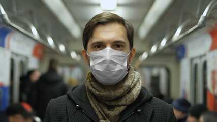 Corona Virus. Man in Face Mask Covid-19. Subway Station. Epidemic Coronavirus Mers. Pandemic Flu. Human Masked 2019-ncov. Train Metro Tube. People. Male Health Care. Smog Air Filter.