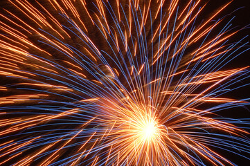 Fireworks bright explosion on black sky background