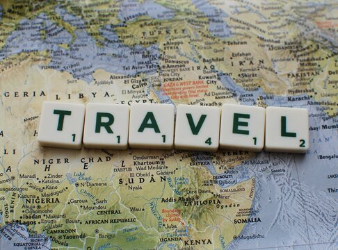 Travel Concept, Map And Scrabble Game Letters, March 22, 2018 In Vilnius, Lithuania.