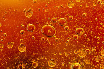 Abstract colorful background with oil drops and waves on water surface