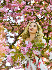 Girl enjoy sakura in garden. Cherry tree. Good vibes. Floral aroma. Harmony and female energy. Spring blossoming tree. Spring symbol. Reasons why flowers always make women happy. Happy spring day