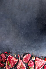 Set of various classic, alternative raw meat, veal beef steaks - chateau mignon, t-bone, tomahawk,...