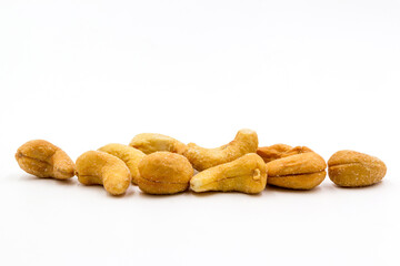 Roasted salted cashew nuts isolated on white background