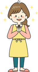 キラキラした目で喜ぶエプロン姿の主婦（全身）
