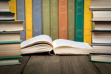 An open book on a table in a library. Education concept, back to school.