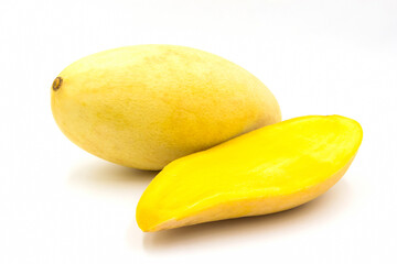 Ripe yellow mango fruit​ (Barracuda​ mango)​ with​ sliced​ isolated on​ white background