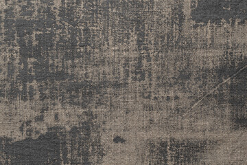 Rustic background with canvas texture with with spots of gray paint