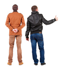 Back view of two man in winter jacket showing thumb up.