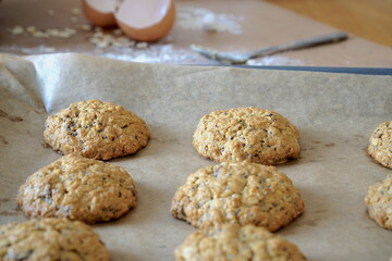 Homemade healthy oatmeal cookies with raisins and chia on the table. 