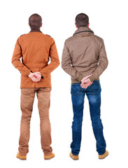 Back view of couple in winter jacket.