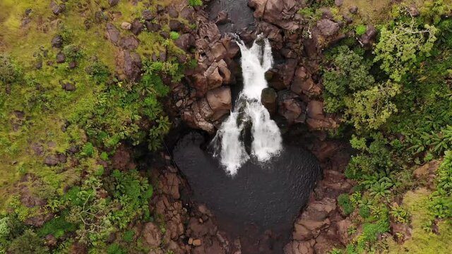 Aerial drone view of flying down to Kondwal Waterfall, Maharashtra, India