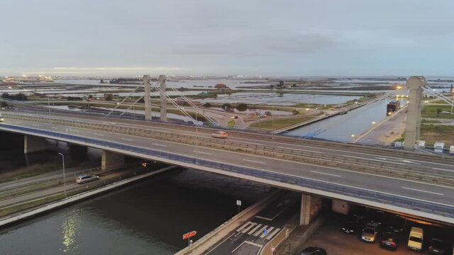 View of highway with cars in Aveiro. The Venice of Portugal. Drone View