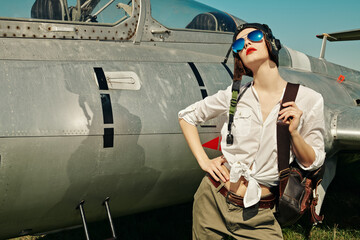 girl pilot in sunglasses