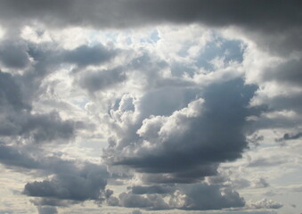 Large cumulus clouds in the sky.  Beautiful wallpaper
