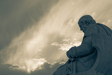 filtered image of of Plato the ancient Greek thinker isolated on impressive sky, space for text