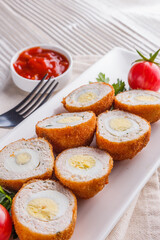 Scotch egg meat balls on rustic wooden background