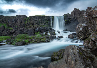 A composite shot of Oxararfoss waterfall in Thingvellir National Park Iceland! I image stacked 2 images to perfect the sharpness.