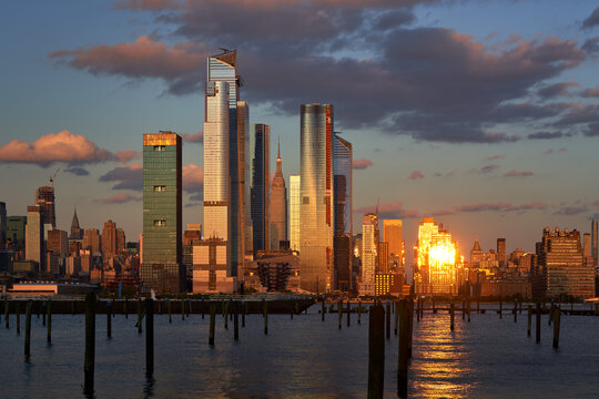 The newly developed Hudson Yards skyscrapers at Sunset. Manhattan Midtown West cityscape from across the Hudson River, New York City, NY, USA