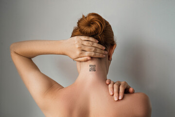 young woman with code on the back of her head for identification. Mass chipization of the population, collection of databases, technologies of the future.