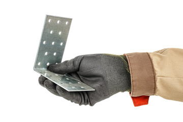 Galvanized metal mounting bracket with holes in worker hand in black protective glove and brown...