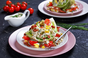 close-up of iceberg wedge salad on plates