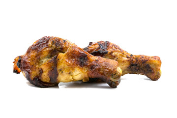 Grilled barbecue chicken drumstick isolated on white background