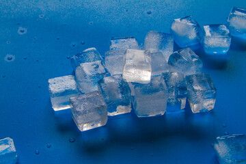 ice cubes close up on blue background