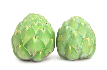 Fototapeta premium two ripe artichokes on white background