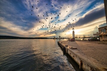 Beautiful sunset and clouds on the beach in Varna, Bulgaria - obrazy, fototapety, plakaty