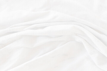 Fototapeta na wymiar Top view Abstract White cloth background with soft waves.Wave and curve overlapping with different shadow of color,white fabric, crumpled fabric.