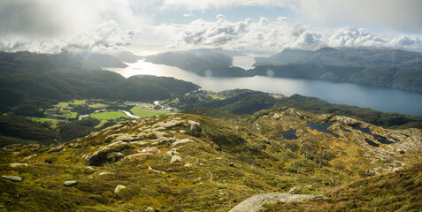 View from Hellandsnuten Mountain to town of Sand and five Fjords. Sandsfjord, Hylsfjord, Saudafjord, Vindafjord and Lovrafjord. Norway.