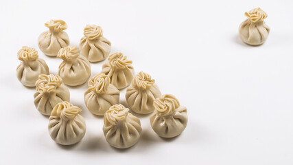 Khinkali on white background.