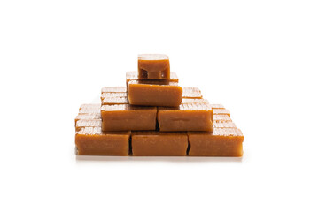 Tasty caramel candy isolated on white background.