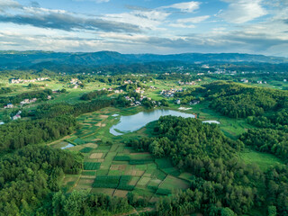 Fototapeta na wymiar Rural countryside aerial view, green countryside and villages, Hunan, China。