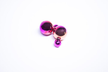 Pink round earrings. jewelry and accessories concept. Isolated, copy space. Macro Shot. High quality photo