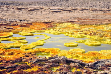 Fototapeta na wymiar Etiopia. Dallol Lake, Ethiopia. The colorful landscape of Dallol lake in Crater of Dallol Volcano. Lake Dallol with its sulphur springs is the hottest place on the Earth.