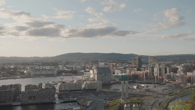 Static wide shot of downtown Bj&oslash;rvika, with construction of S&oslash;renga, Barcode and Edvard Munch gallery, in Oslo Norway.