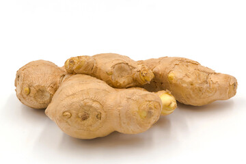 Fresh ginger root herb isolated on white background