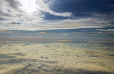 Fototapeta na wymiar View from blue sky from airplane window