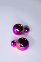 Pink round earrings. jewelry and accessories concept. Isolated, copy space. Macro Shot. High quality photo
