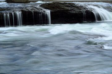 beautiful massive river flow and waterfalls in summer nature