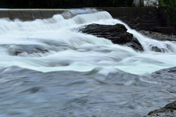 beautiful massive river flow and waterfalls in summer nature