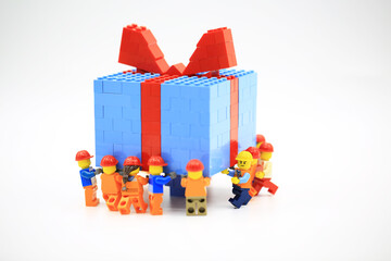 Obraz premium HONG KONG; NOV 11: lego minifigure with the set of city lego in hong kong on 11 November 2017. Legos are a popular line of plastic construction toys manufactured by The Lego Group in Denmark