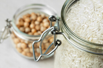 Beans assortment on white stone table, close up.
