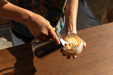 women learning to make latte art.