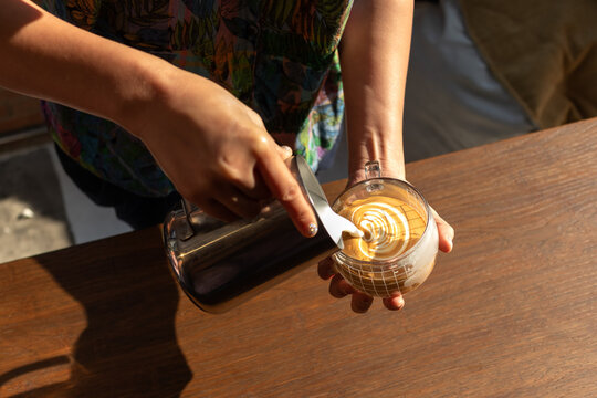 Women Learning To Make Latte Art.