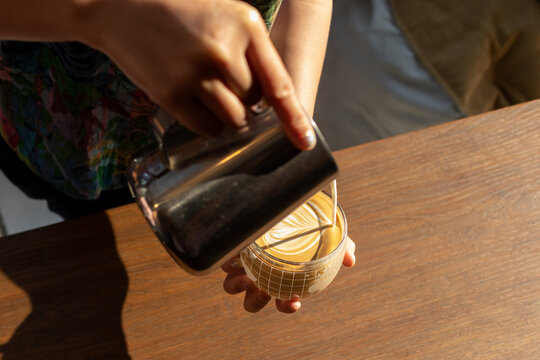 Women Learning To Make Latte Art.