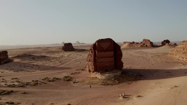 Saudi pull back wider on temple in Al Ula, Saudi Arabia, aerial shot on drone in 10bit